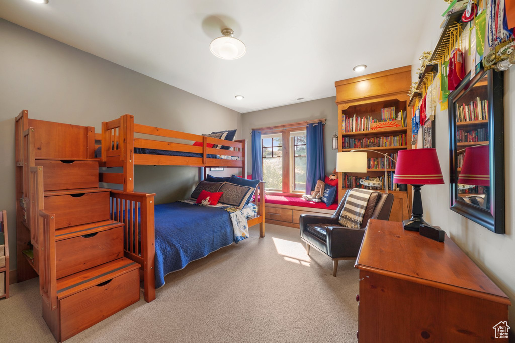 Bedroom featuring recessed lighting and carpet