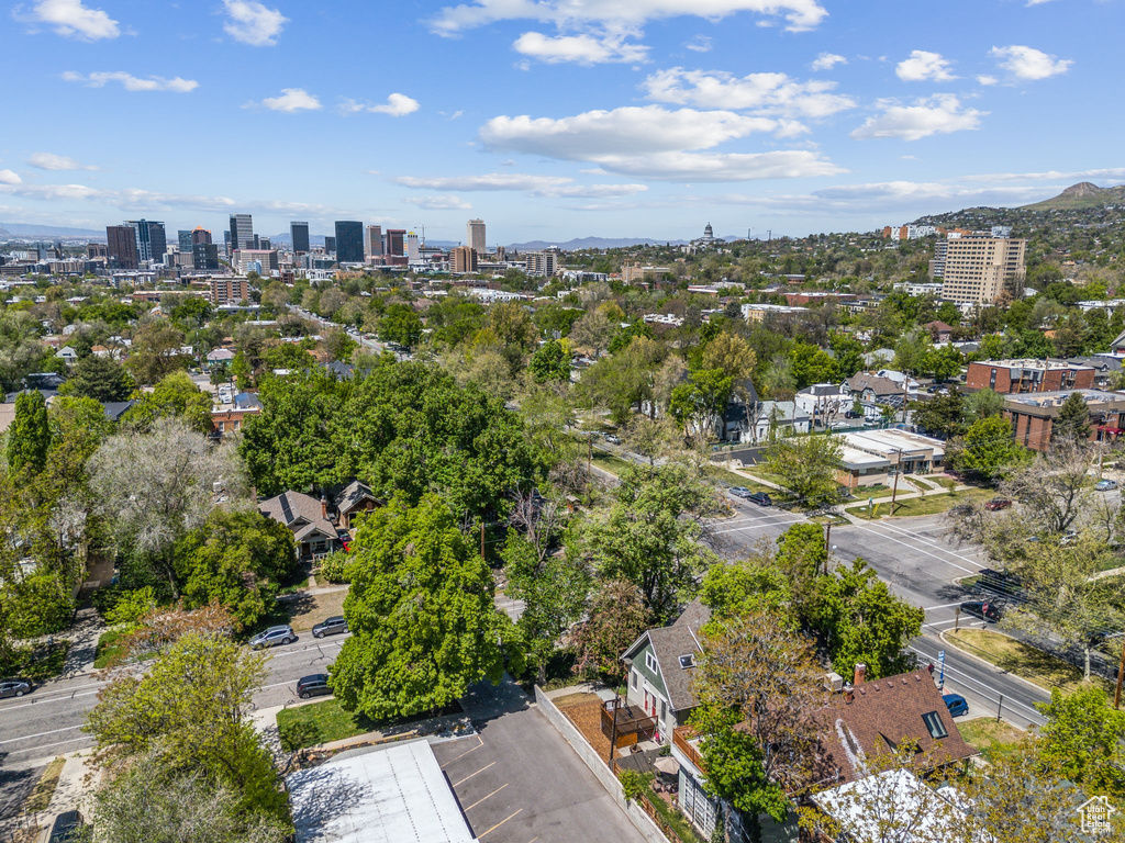 Birds eye view of property with a view of city