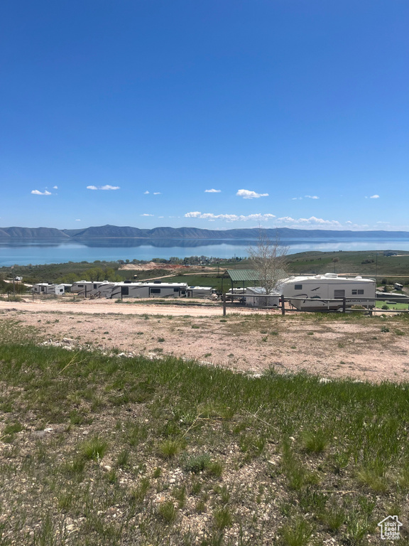View of mountain background featuring a nearby body of water