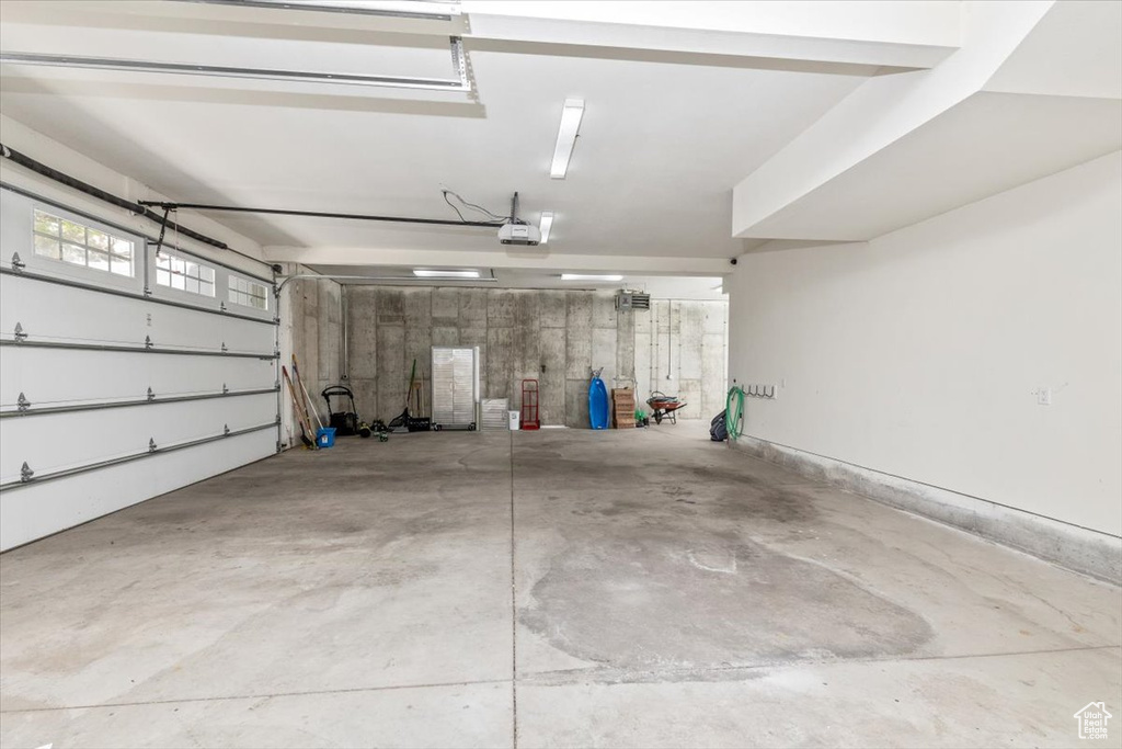 Garage featuring a garage door opener