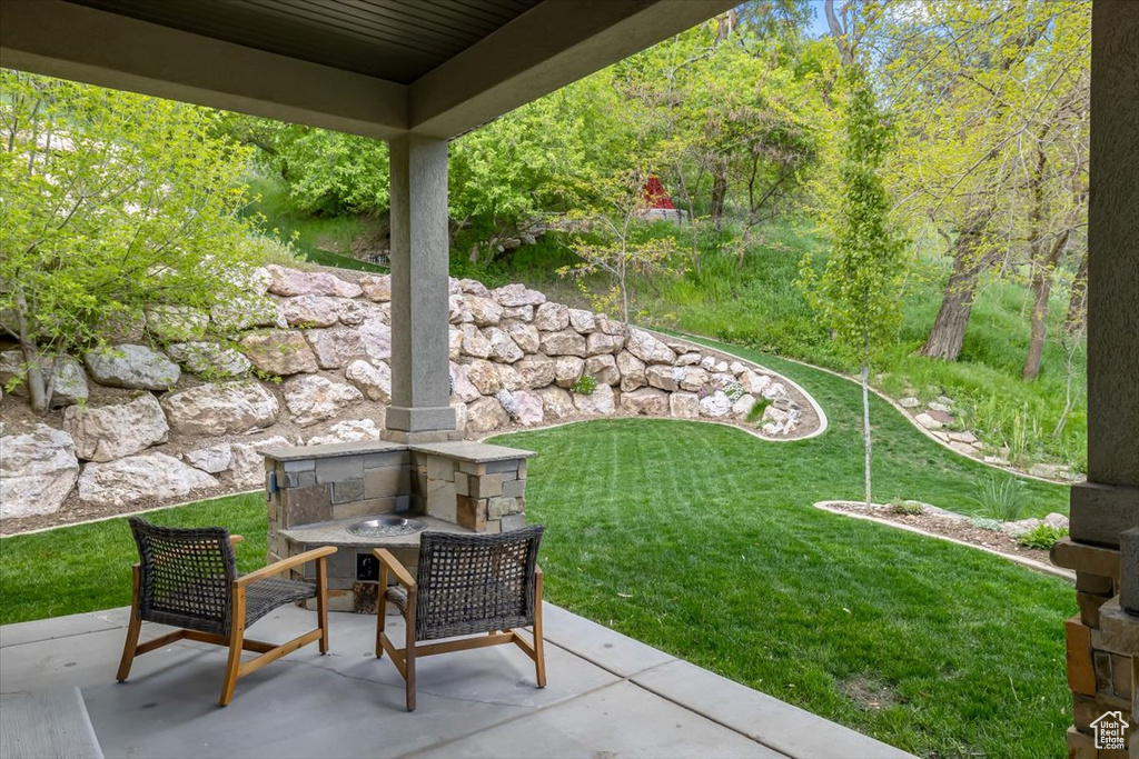 View of yard with a patio