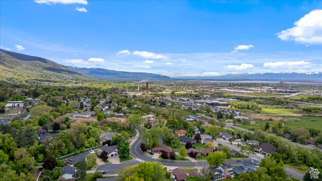 Drone / aerial view with a mountain view and a residential view