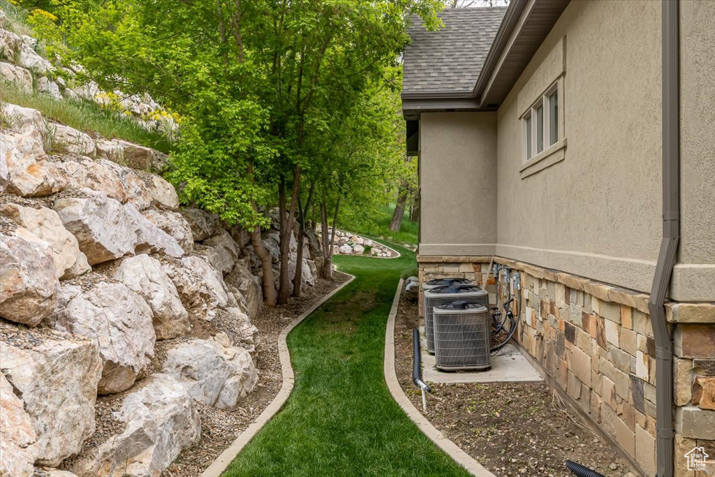 View of yard featuring central air condition unit