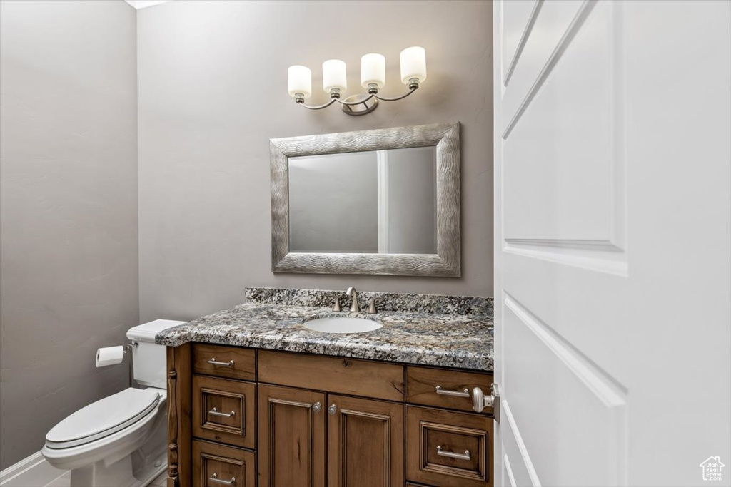 Bathroom featuring toilet and vanity