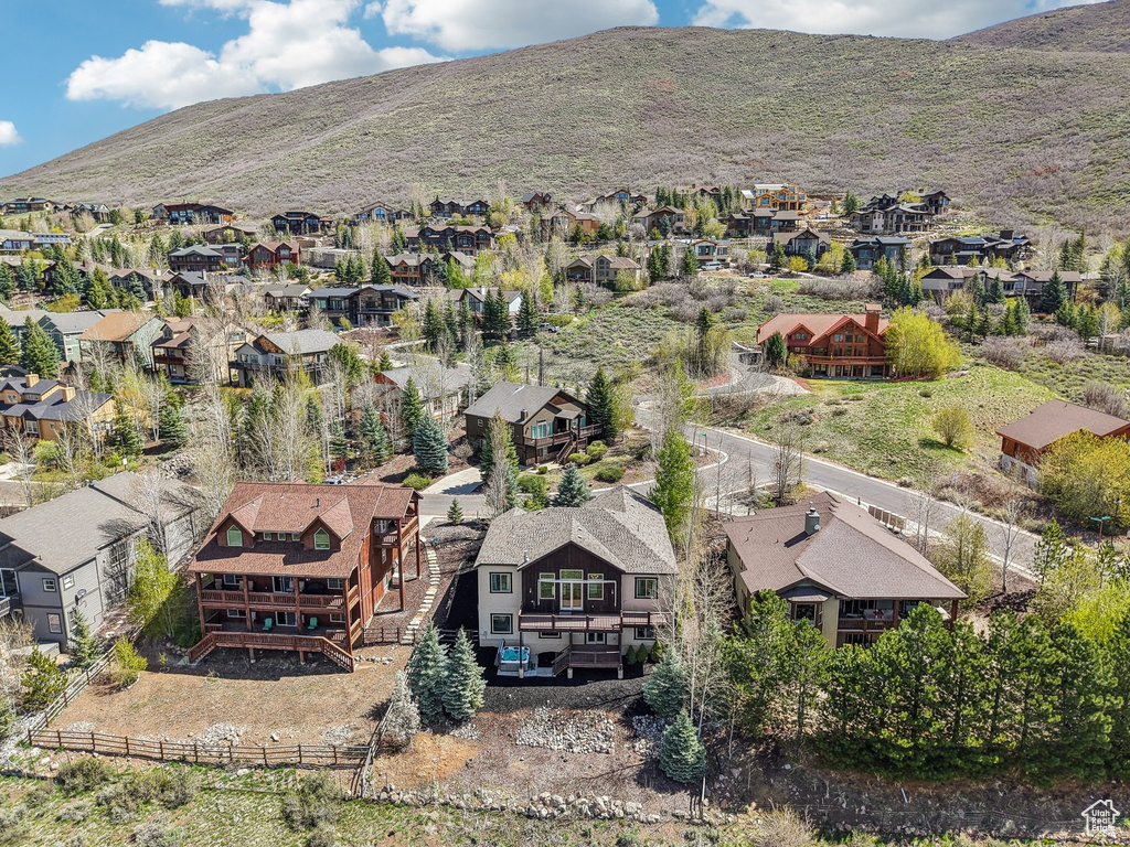 Drone / aerial view with a mountain view and a residential view
