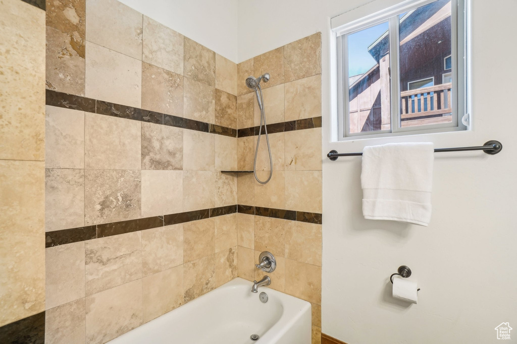 Bathroom featuring shower / bathing tub combination