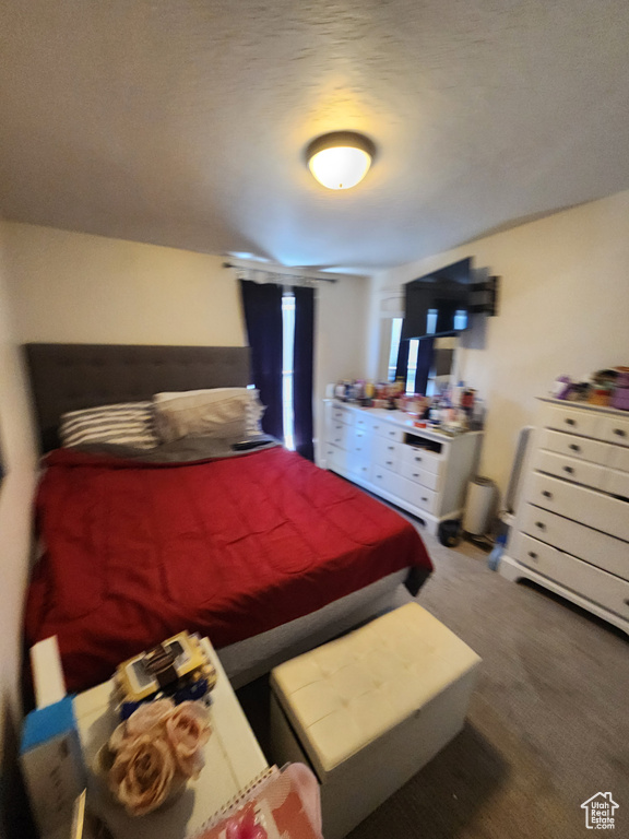 Bedroom with carpet