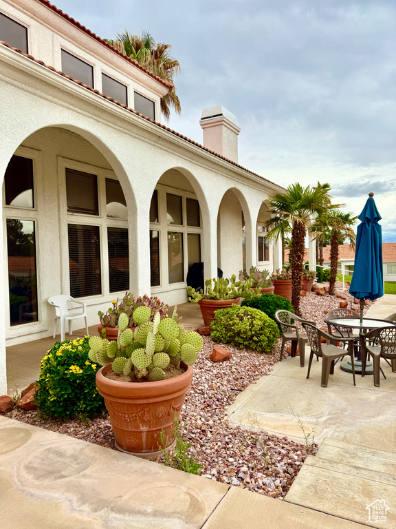 View of patio with outdoor dining space