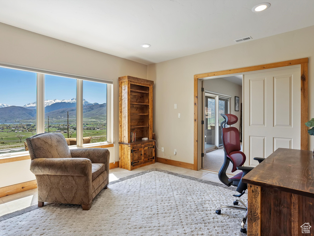 Home office featuring a mountain view, visible vents, baseboards, and recessed lighting