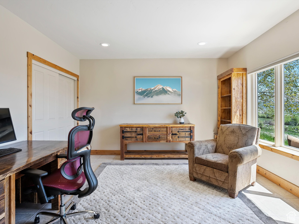 Office area with baseboards and recessed lighting
