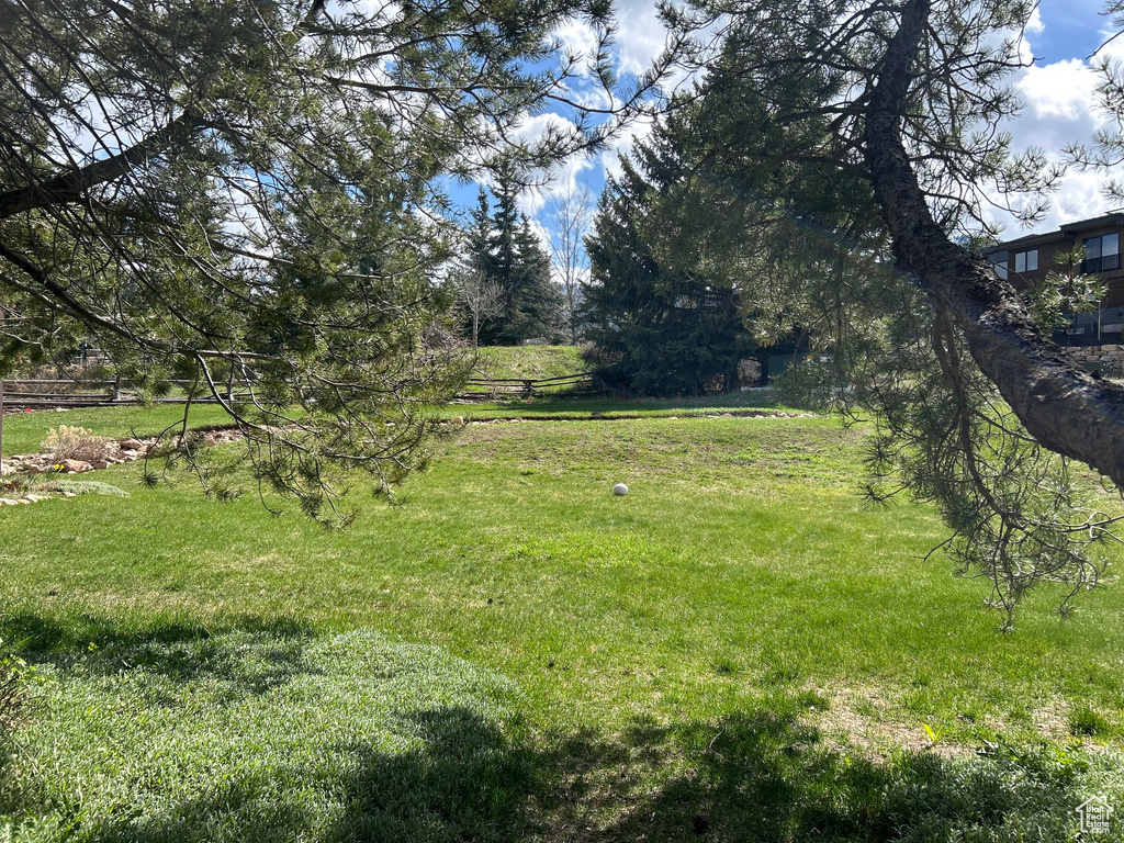 View of yard with fence