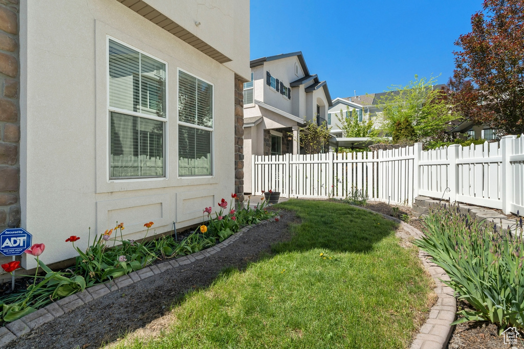 View of yard with fence