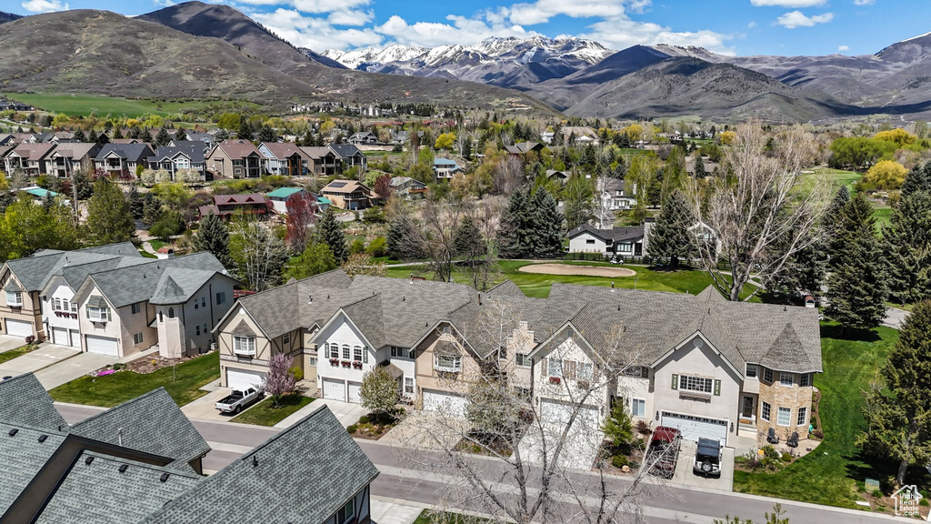 Drone / aerial view featuring a residential view and a mountain view