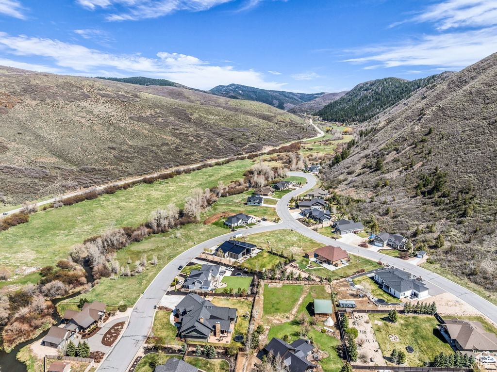 Aerial perspective of suburban area with mountains