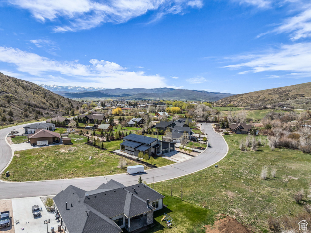 Aerial view of residential area with a mountain backdrop