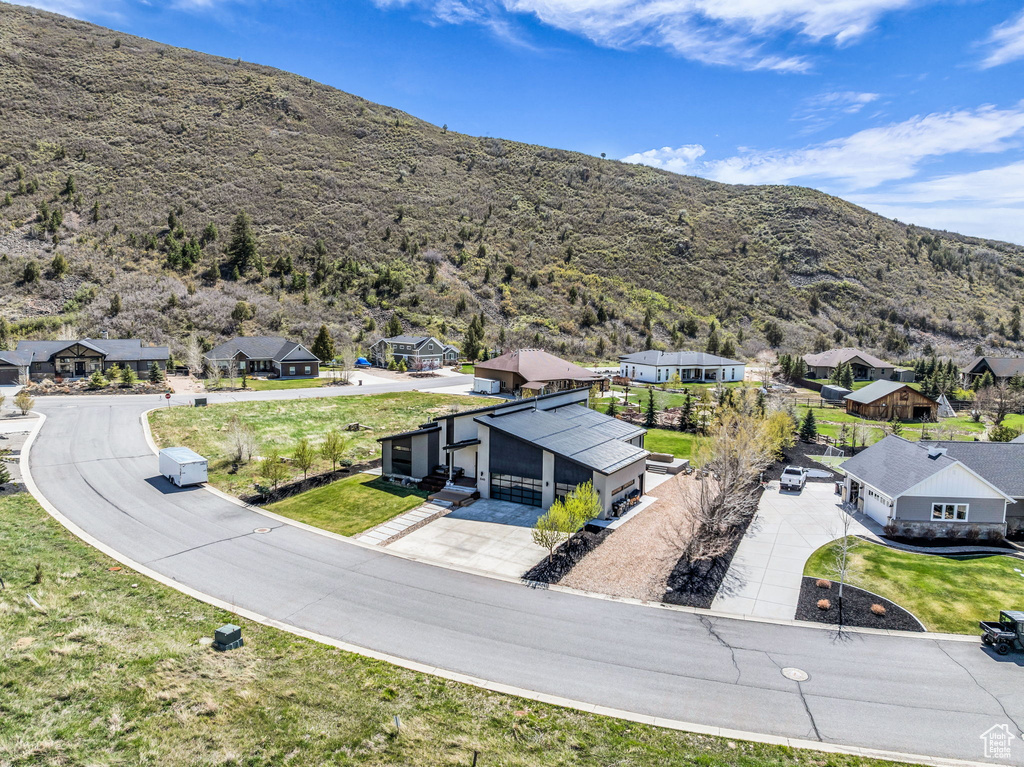 Aerial view of residential area with a mountain backdrop