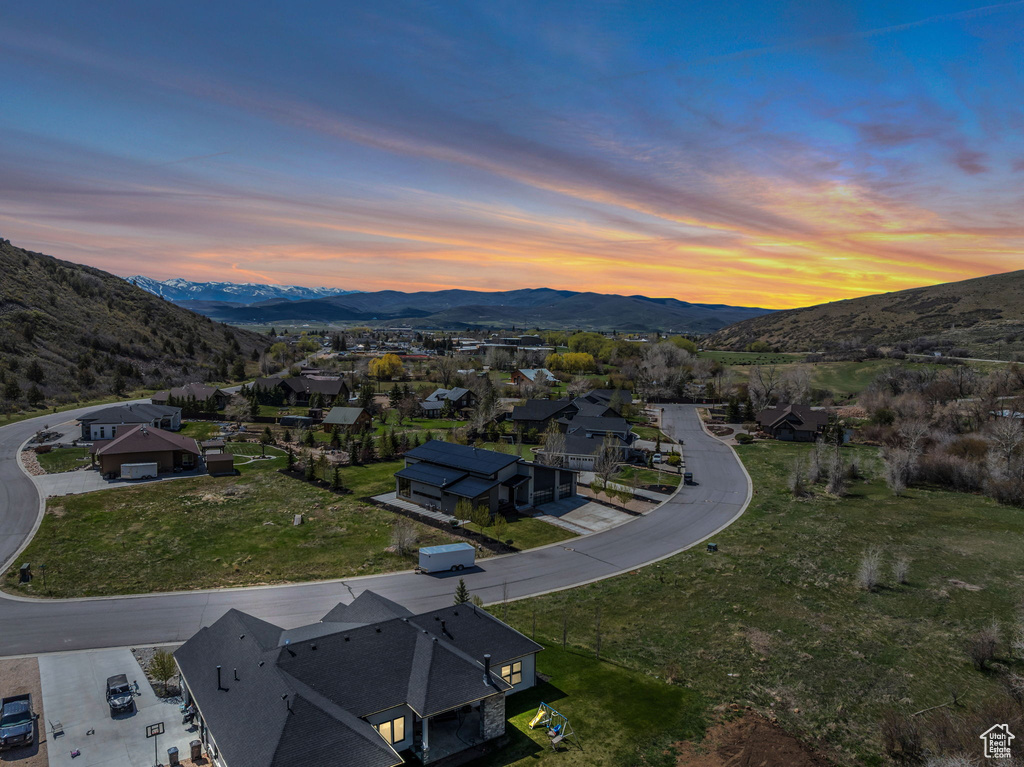 Aerial view at dusk of a mountain view and a residential view