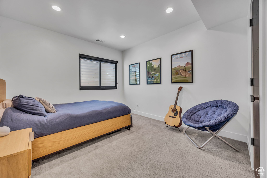 Bedroom with carpet, baseboards, and recessed lighting