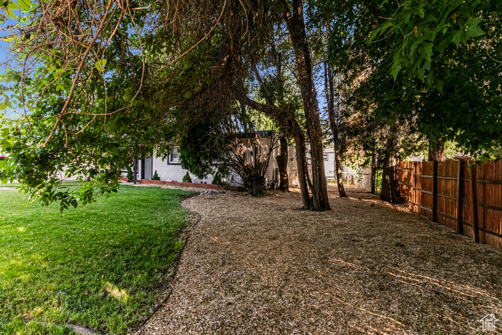 View of yard with fence