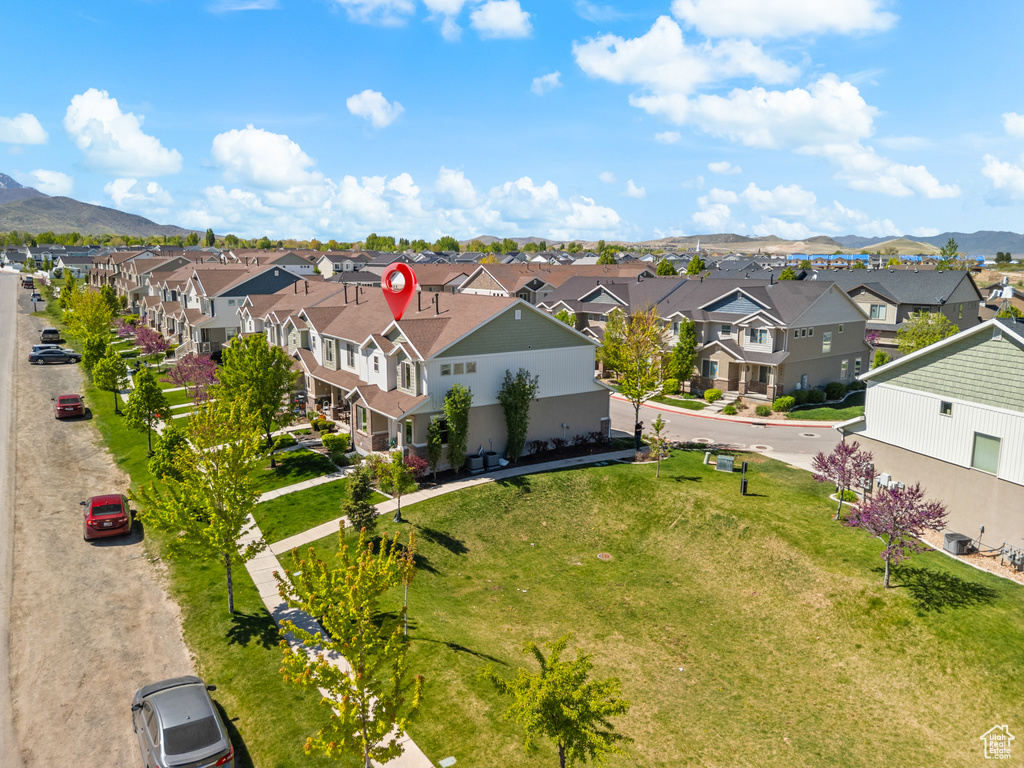 Drone / aerial view with a mountain view and a residential view