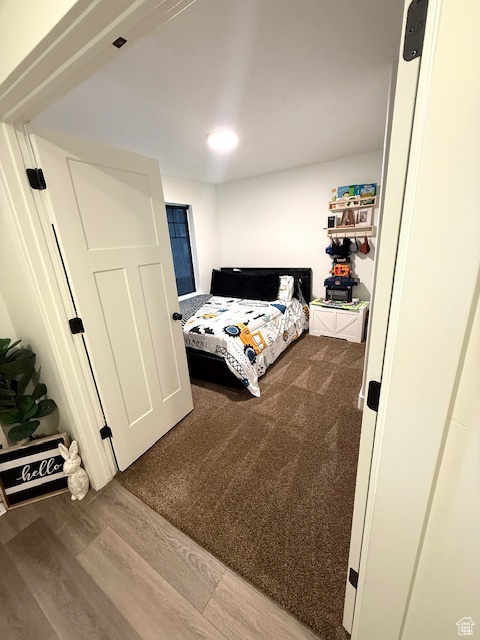 Bedroom featuring wood finished floors
