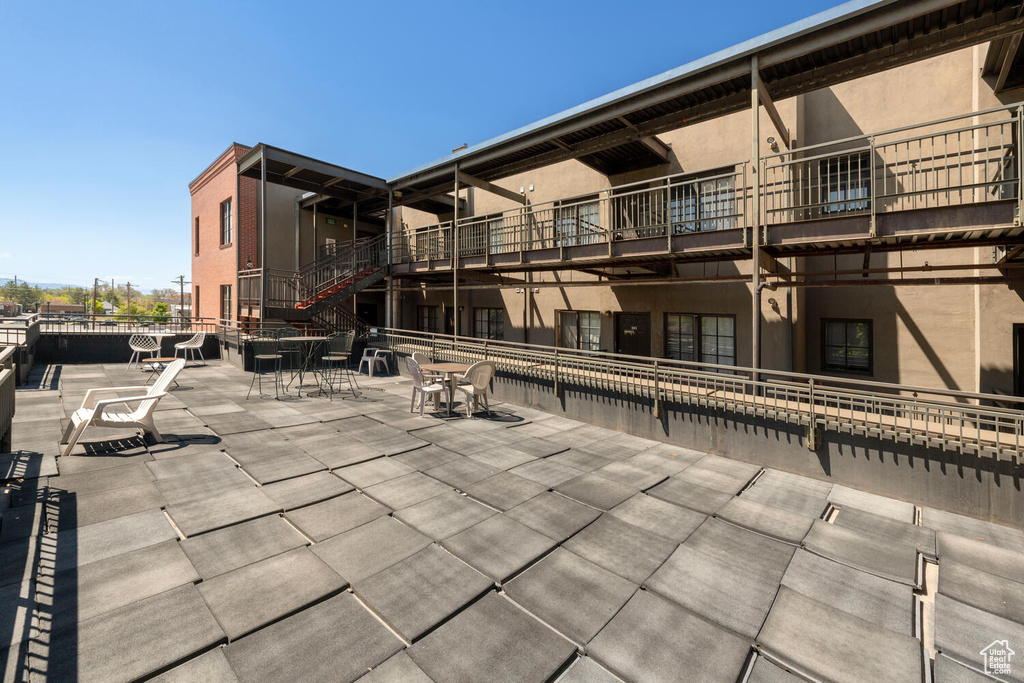 Exterior space featuring a patio and outdoor dining area