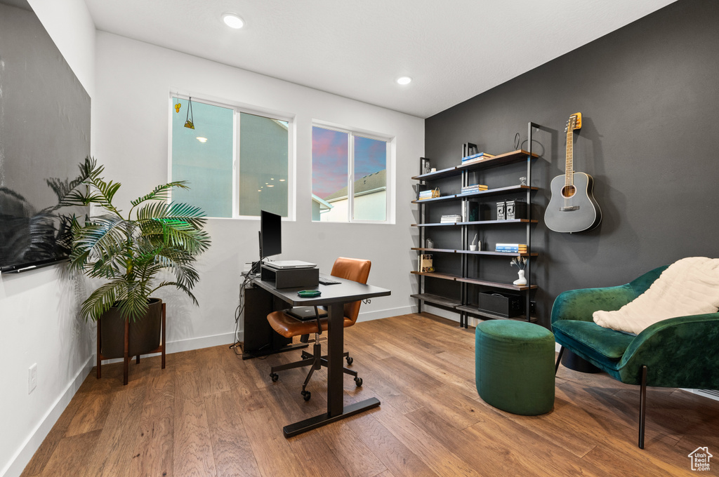 Office with recessed lighting, baseboards, and wood finished floors