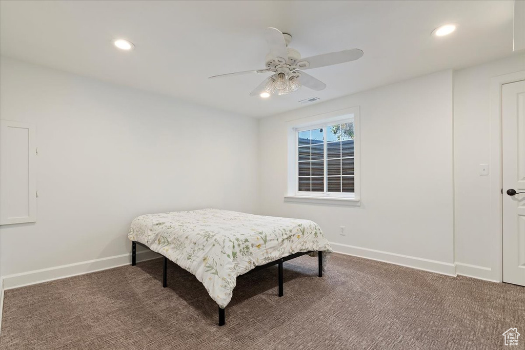 Bedroom with baseboards, recessed lighting, visible vents, and carpet floors