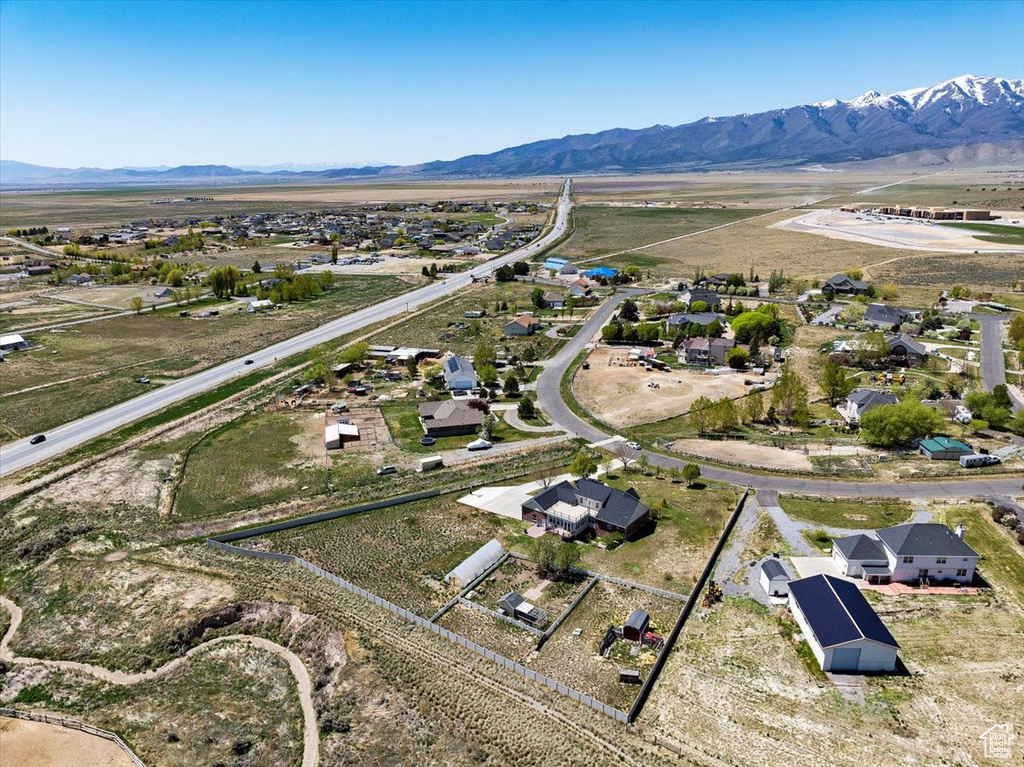 Drone / aerial view featuring a mountain view and a residential view