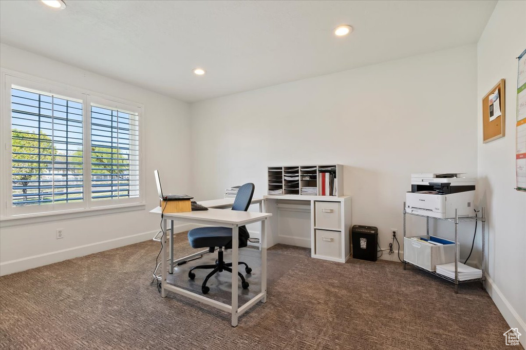 Office with baseboards, dark carpet, and recessed lighting