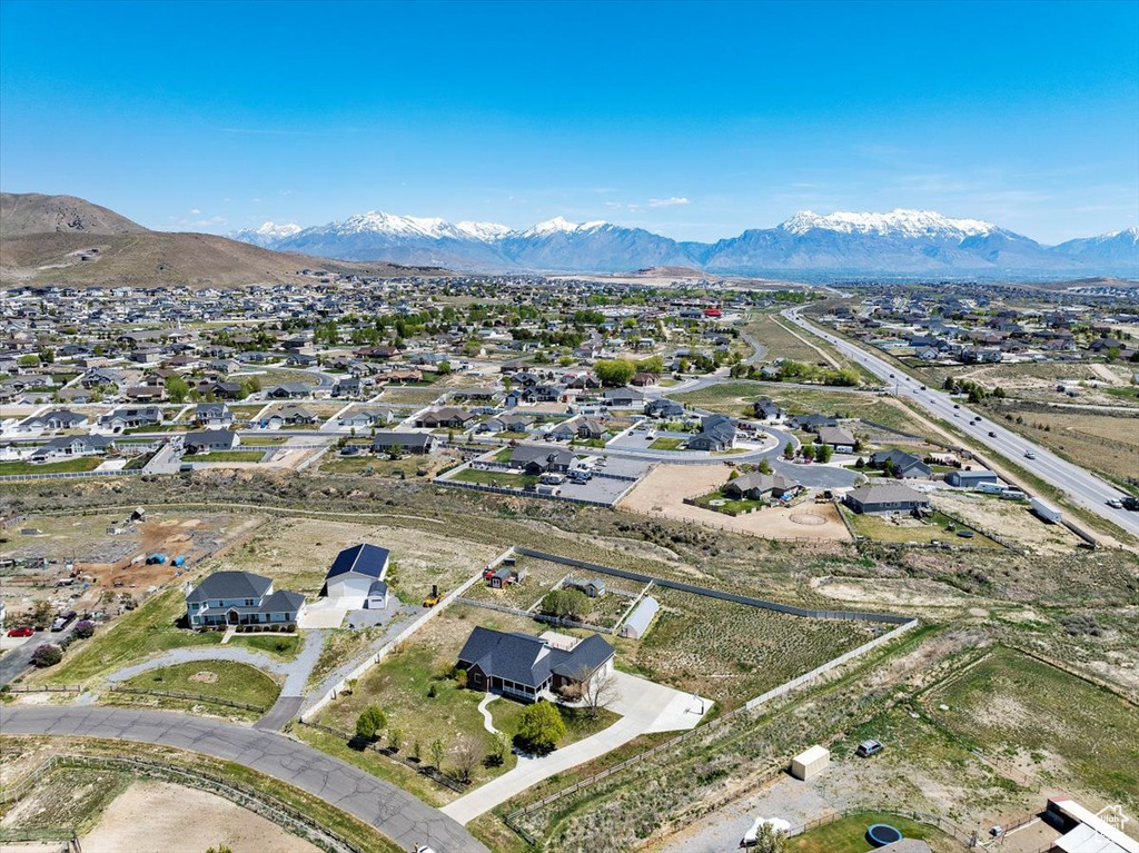 Aerial view featuring a mountain view and a residential view