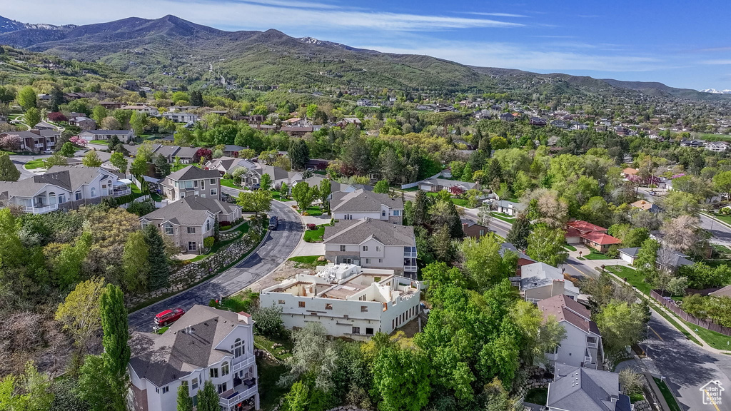 Drone / aerial view with a residential view and a mountain view
