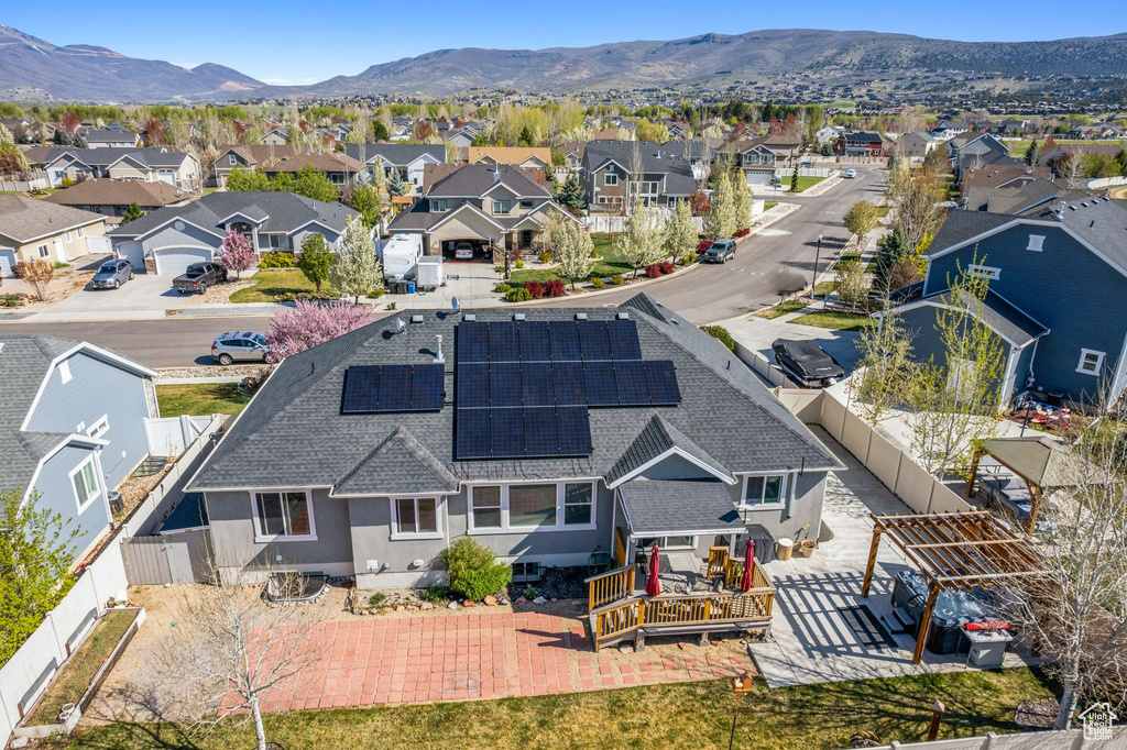 Birds eye view of property featuring a mountain view and a residential view