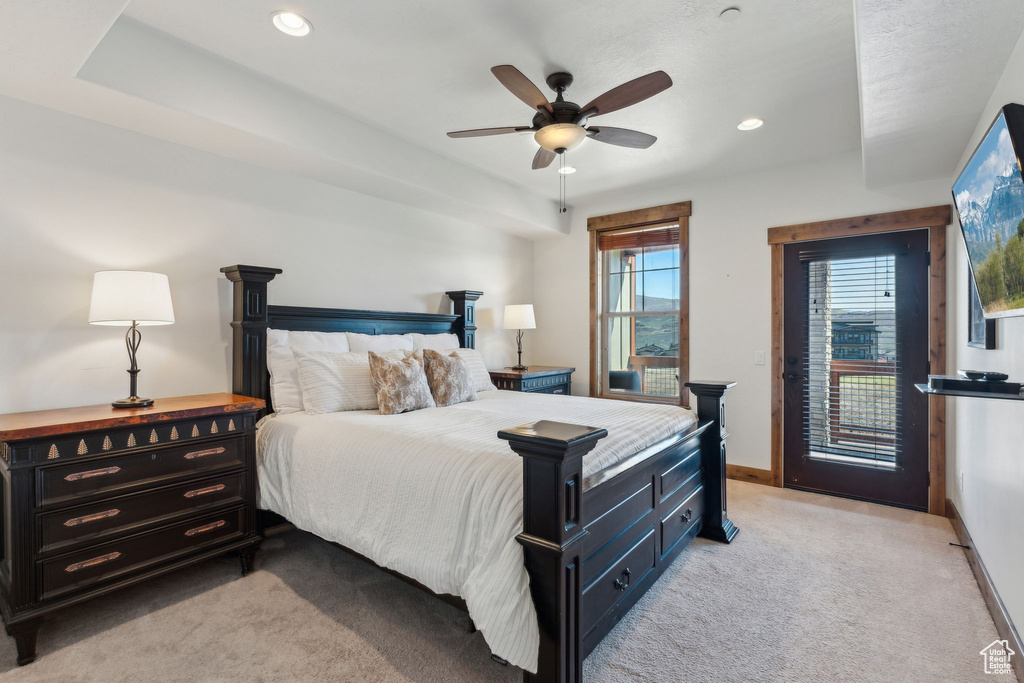 Bedroom featuring baseboards, access to outside, recessed lighting, light colored carpet, and a ceiling fan
