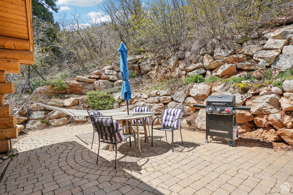 View of patio / terrace with grilling area and outdoor dining space
