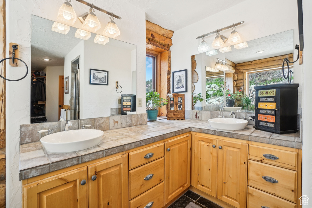 Bathroom with a sink and double vanity