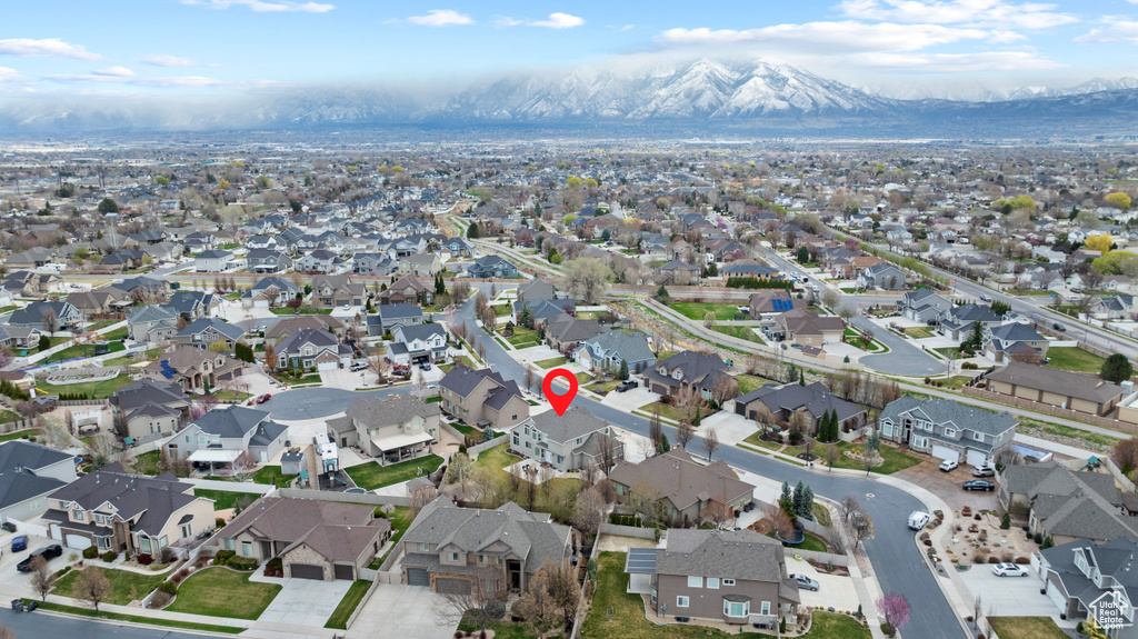 Birds eye view of property featuring a mountain view and a residential view
