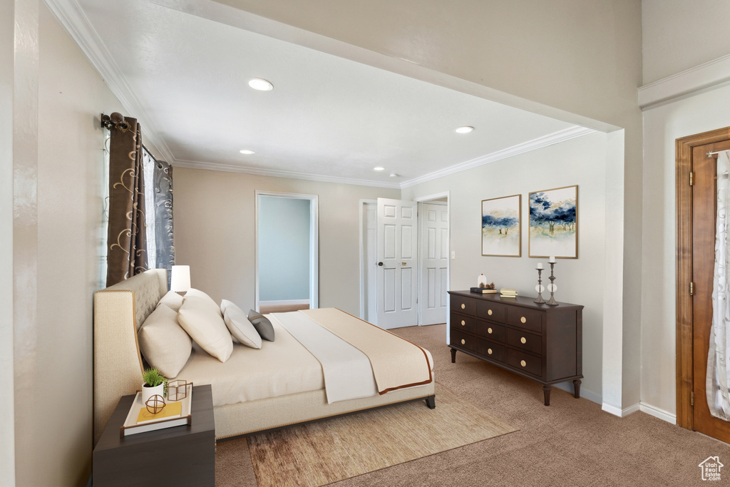 Carpeted bedroom with recessed lighting, ornamental molding, and baseboards