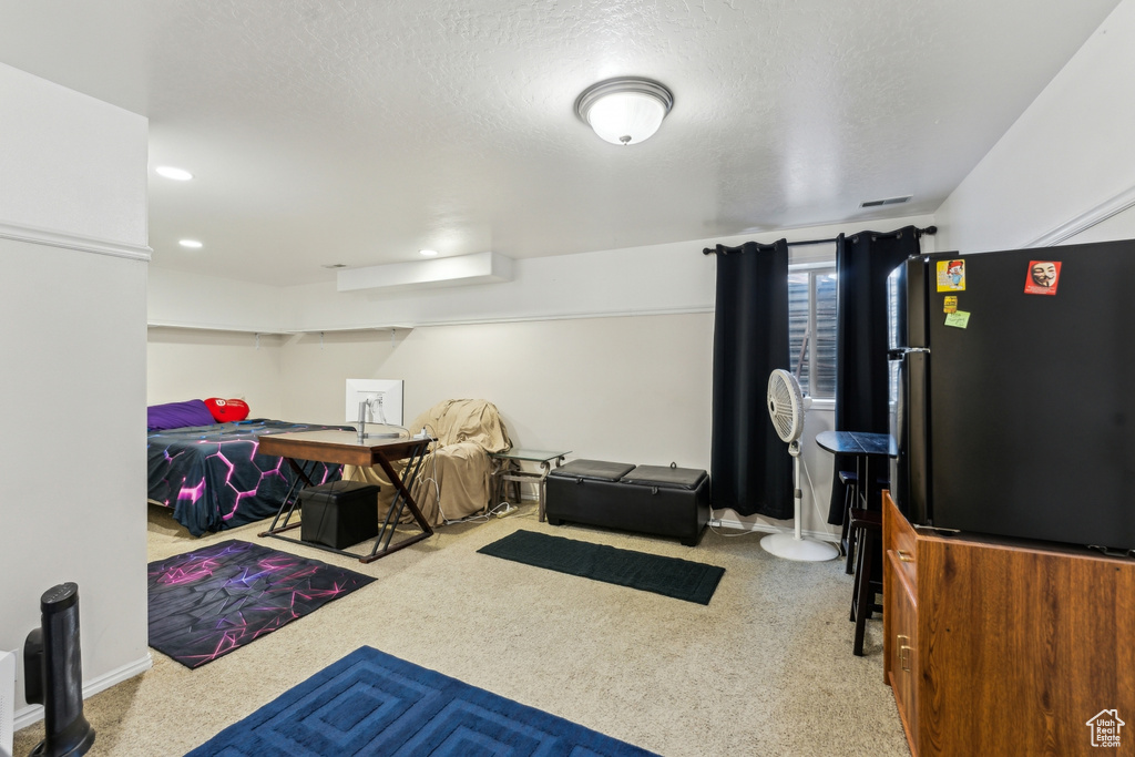 Misc room featuring recessed lighting, baseboards, and a textured ceiling