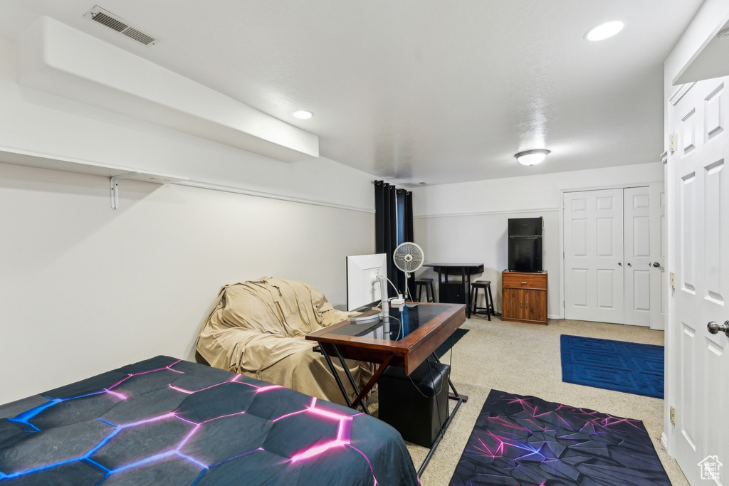 Bedroom featuring carpet flooring and recessed lighting