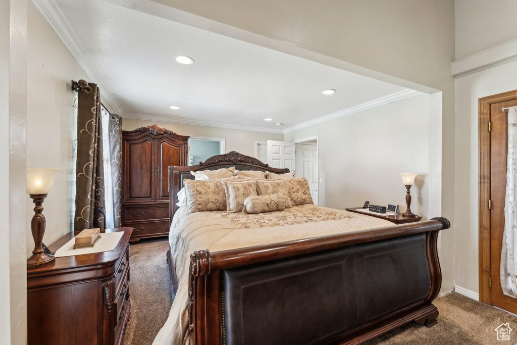 Bedroom with carpet flooring, recessed lighting, and crown molding
