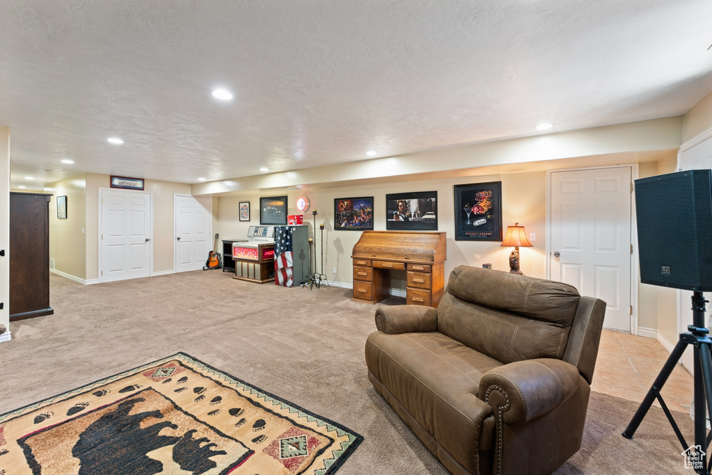 Living room featuring recessed lighting, carpet floors, and baseboards