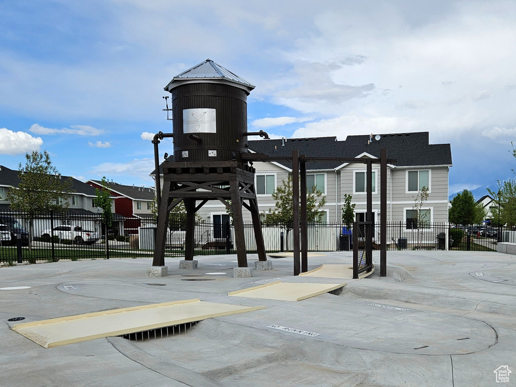 View of home\\\'s community with fence and a residential view