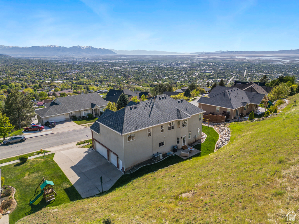 Aerial view featuring a residential view and a mountain view