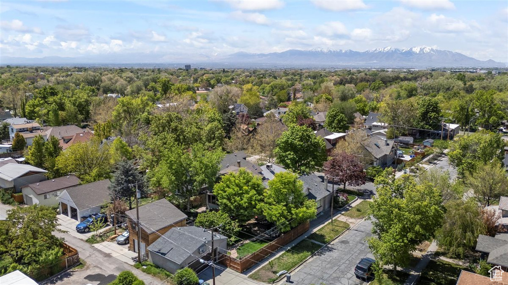 Drone / aerial view with a residential view and a mountain view
