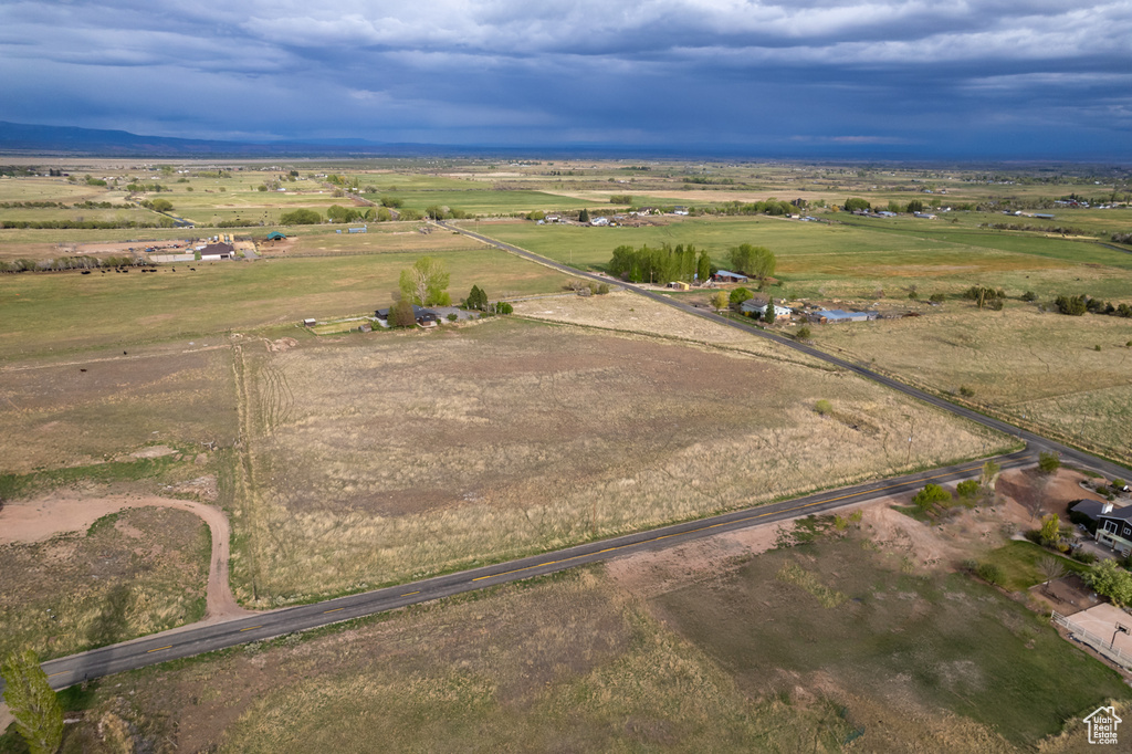Aerial view of property and surrounding area with rural landscape