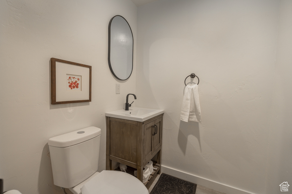 Bathroom featuring toilet and vanity