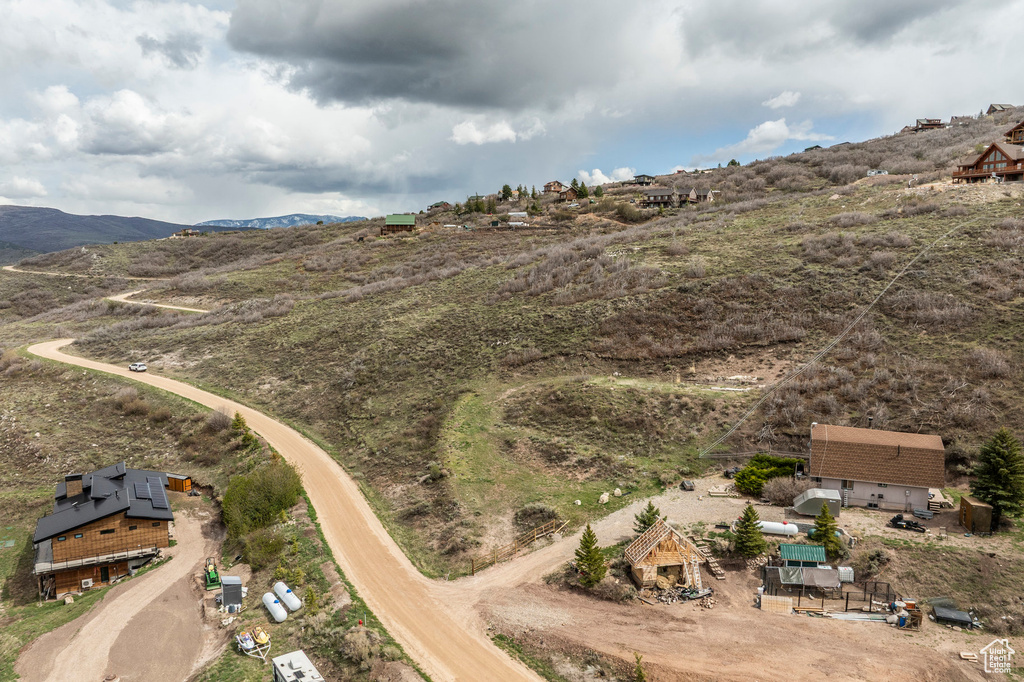 Birds eye view of property featuring a mountain view