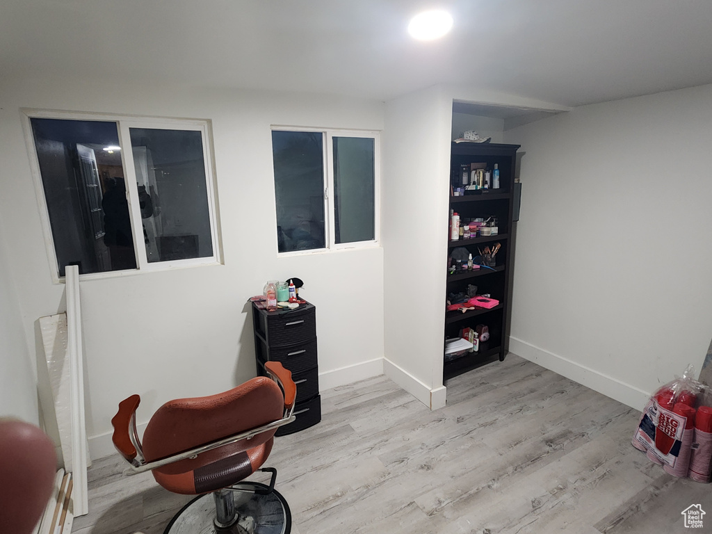 Sitting room featuring wood finished floors and baseboards