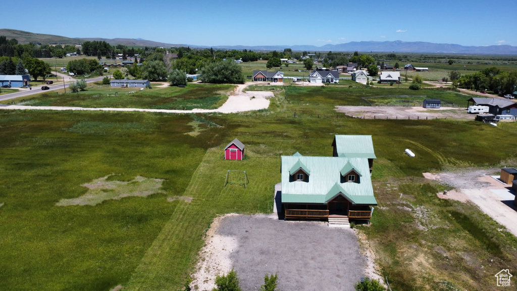 View of subject property featuring mountains